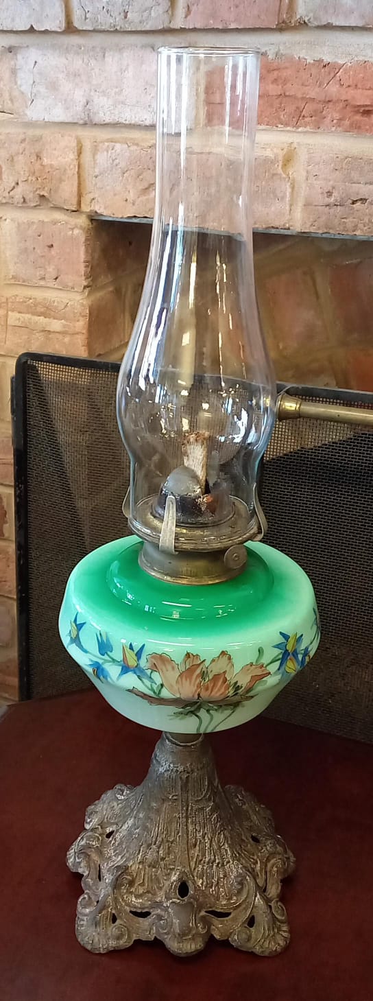 The main photo for Large  Victorian Oil Lamp with handpainted glass tank and cast Iron base