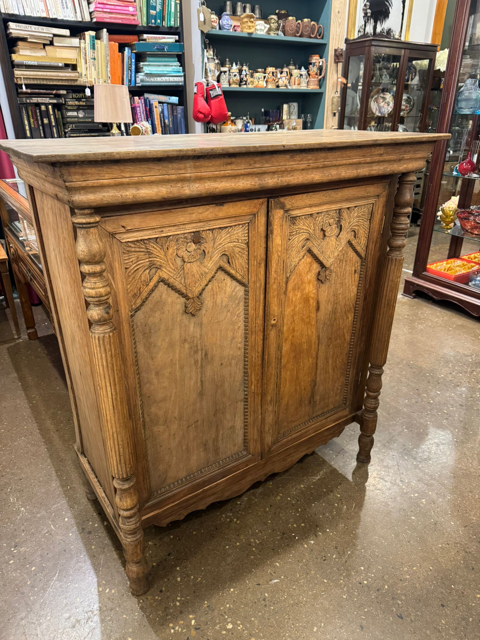 The main photo for 1860’s French light oak with carved details and turned columns armoire linen press.